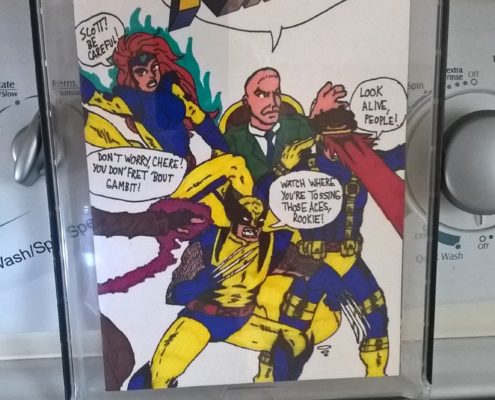 A comic book is displayed in a glass case.