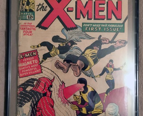 A framed comic book cover of the x-men